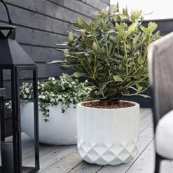 LuxenHome 14.7 In. Round Modern White MgO Planter